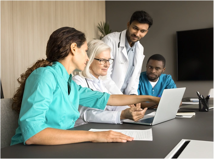 Doctors reviewing reports